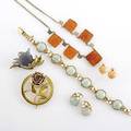Gold jewelry ca 19001960 carved chalcedony pearl and 14k flower brooch bicolor 14k rose and circle brooch art deco enameled gold and carnelian necklace coral and diamond earrings mings jade and