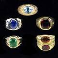 Five gemset gold rings faceted oval topaz and rubelite in fluted 14k yg oval aquamarine 3 cts in textured 14k yg faceted blue sapphire 5 cts and diamond accents in 14k wg cabochon emerald 2