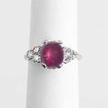 Star ruby and diamond ring ca 1945 oval cabochon ruby approx 25 cts and diamond triplet shoulders in 14k wg 41 gs size 5