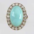 Turquoise and diamond cluster ring ca 1950 oval turquoise cabochon 20mm x 125mm and twenty brilliant cut diamonds approx 120 cts tw in 14k wg 121 gs size 7 12