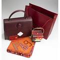 Accessories by cartier baumann  hermes must de cartier burgundy handbag with registry card and dust bag 10 14 x 13 katherine baumann chinese take out jeweled evening bag 4 12 x 7 hermes f
