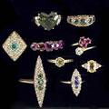 Nine gemset gold rings many with diamonds 19001960 includes ruby amethyst topaz tourmaline emerald sapphire and yellow sapphire 303 gs sizes 4 129