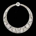 Art deco diamond and platinum circle brooch openwork crescent and star approx 1 cts tw oec diamonds millegrained 58 gs 1 14