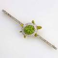 Demantoid garnet and diamond turtle brooch sweden 1917 rose cut diamonds and bright green garnets platinumtopped 18k yg engraved edges 17 gs 3 12