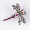 Art nouveau gemset dragonfly brooch ca 1900 silvertopped gold wings set with rose cut diamonds emerald thorax ruby eyes and tail 83 gs 1 78 x 1 58