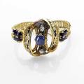 Gemset and enameled 18k bracelet the central element of foliate and enameled loops with two mine cut diamonds and a blue sapphire cabochon to woven gold straps mid 19th c unrecognized mark on tong