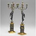 Pair of bronze candelabra patinated winged victory figures with dore decoration 20th c 20 12