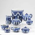 Wedgwood jasperware nine pieces with classic grecian court and mythological scenes ca 1930 includes large cache pot two teapots two pair of creamer and sugar pitcher and sugar missing lid mo