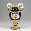 Meissen porcelain urn with floral reserve gilded highlights on cobalt ground and snake handles early 20th c crossed swords mark 15