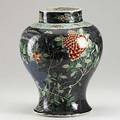 Chinese export vase in famille verte on black ground with floral and animal decoration 19th c 13