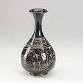 Sgraffitto bottle vase cizhoustyle cut glaze vase with foliate design 20th c 11