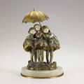 Demetre h chiparus romanian 18861947 dore bronze and ivory group of smiling children under an umbrella on bronzetrimmed onyx base early 20th c signed 9 12 x 6 12 x 5 14