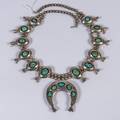 A Southwestern Sterling Squash Blossom Necklace