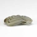 Greyish white jade finger citron with chilong well rendered citron with sinuous chilong crawling along one side 19th c brown inclusions 3
