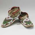 Moccasins pair of plains indians beaded moccasins with white green red and blue beading 19th20th c 4 12 x 11 x 4