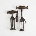 Two english corkscrews london rack type with iron frames and wooden handles 19th c one marked lund maker cornhill and fleet st london 7 12