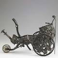 Christofle mechanical wine trolley silver plate in the form of a carriage with applied grape vines 20th c marked 13 x 9 12 x 7