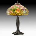 Tiffany studios table lamp in peony pattern new york 1920s leaded glass patinated bronze six sockets base stamped tiffany studios new york overall 34 x 22 12 shade 10 34 x 22 12