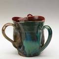 George ohr threehandled cup deep matte red green flambe and amber glaze biloxi 1900s script signature 4 x 5