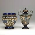 Doulton lambeth two stoneware items late 19th c aesthetic movement covered urn with incised floral decoration and similar jardiniere both with impressed markartist cipher the urn also inscribed