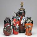 Japanese sumida gawa pottery four vases with applied decoration one mounted as a lamp late 19thearly 20th c tallest 12 without mounting