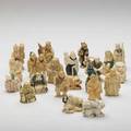 Asian ivory twentyone items including netsuke 20th c some marked largest 2 14