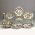 Chinese rose medallion group nine items 19th20th c pair of candlesticks covered entree dish three bowls and three platters largest 10 14 x 4 34
