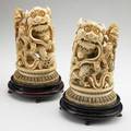 Pair of chinese ivory foo dogs coral eyes 19th20th c signed 8 12 x 5 x 4 12