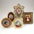 Limoges etc five handpainted plaques 19th20th c four busts of women and one full length portrait of a serving woman one marked limoges largest 11 x 8