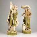 Royal dux porcelain figures of a male and female water carrier 20th c marked taller 28