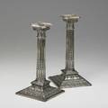 Pair of sterling candlesticks in the georgian style by philip oriel weighted 20th c 10 14