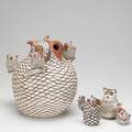 Pueblo pottery group four pieces depicting owls 20th c all signed largest 10 x 8 12 x 10 12