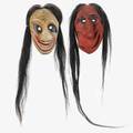 Two false face masks spoon face with polychrome decoration and red face both with horsehair 20th c signed grand river a hoffman larger 10 12 x 6 12