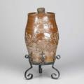 English stoneware ice water cooler two gallon jug decorated with grapevines knights lions and the coat of arms of the british monarchy 19th c complete with spigot 13 x 8 14 dia