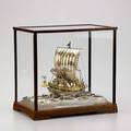Takehiko seki japanese 960 silver treasure ship parcel gilt and enameled takarabune represents good luck and fortune in beveled glass and wood case with plaque inscribed in commemoration of launchi