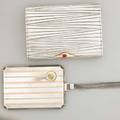 Two silver and gold accessories 84 silver cigarette case with gold and ruby thumbpiece marks for marius hammer and estonia 19201924 gilt interior 4 x 3 american sterling necessary with multi