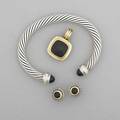 David yurman silver and gold onyx cable jewelry cushionshaped enhancer pendant 1 14 circular stud earrings trimmed in 18k yg 12 open cuff with 14k yg accents all in original pouches 637