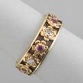 Diamond and ruby gold band concentric design of alternating diamond and ruby flower heads in 14k yg diamonds 30 ct tw ca 1940 27 dwt gw 42 gs gw size 7