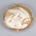 Victorian shell cameo 14k yellow gold brooch ca 1890 depicts hebe among clouds feeding zeus in the form of an eagle 133 dwt 208 gs 2 14 x 2 12