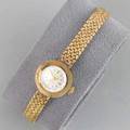 Bulova dior gold bracelet watch circular face with faceted crystal 23 jeweled movement textured woven 14k yg gold strap ca 1970 122 dwt gw 19 gs gw 6