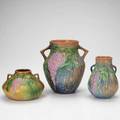 Roseville three wisteria vases of graduated sizes numbers to bases tallest 8 14