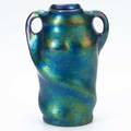 Zsolnay doublehandled vase with inbody twist covered in lustre glaze unmarked 7 x 5 x 4