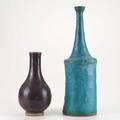Volkmar etc leon volkmar bottle shaped vase together with stoneware bud vase both signed tallest 18