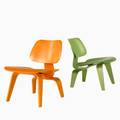 Charles and ray eames herman miller two lounge chairs lcw usa 2010 dyed laminated wood and rubber metal labels each 26 14 x 22 x 25 12