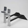 French moderne pair of andirons ca 1970 polished stainless steel painted iron unmarked each 11 x 19 x 3 12