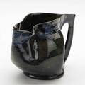 George ohr cutout handle pitcher in cobalt and green glaze biloxi ms ca 1900s stamped ge ohr biloxi miss 3 14 x 5 x 3