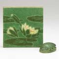 Grueby waterlily tile and scarab paperweight boston ca 1910 tile has artists initials scarab has floral stamp 6 sq 3 x 2