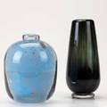 Edvin ohrstrom orrefors two graal pieces cased blue vessel with air bubble inclusions and cased green and ruby glass vase both engraved marks taller 9