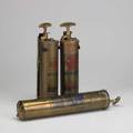 Vintage fire extinguishers three brass extinguishers two super fyrfyter model a and chemical warfare service decontaminating apparatus m2 longer 18