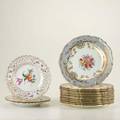 Coalport dresden porcelain fifteen pieces twelve coalport cake plates with floral enamels and gold decoration and three dresden plates with pierced decoration coalport 8 34 dia